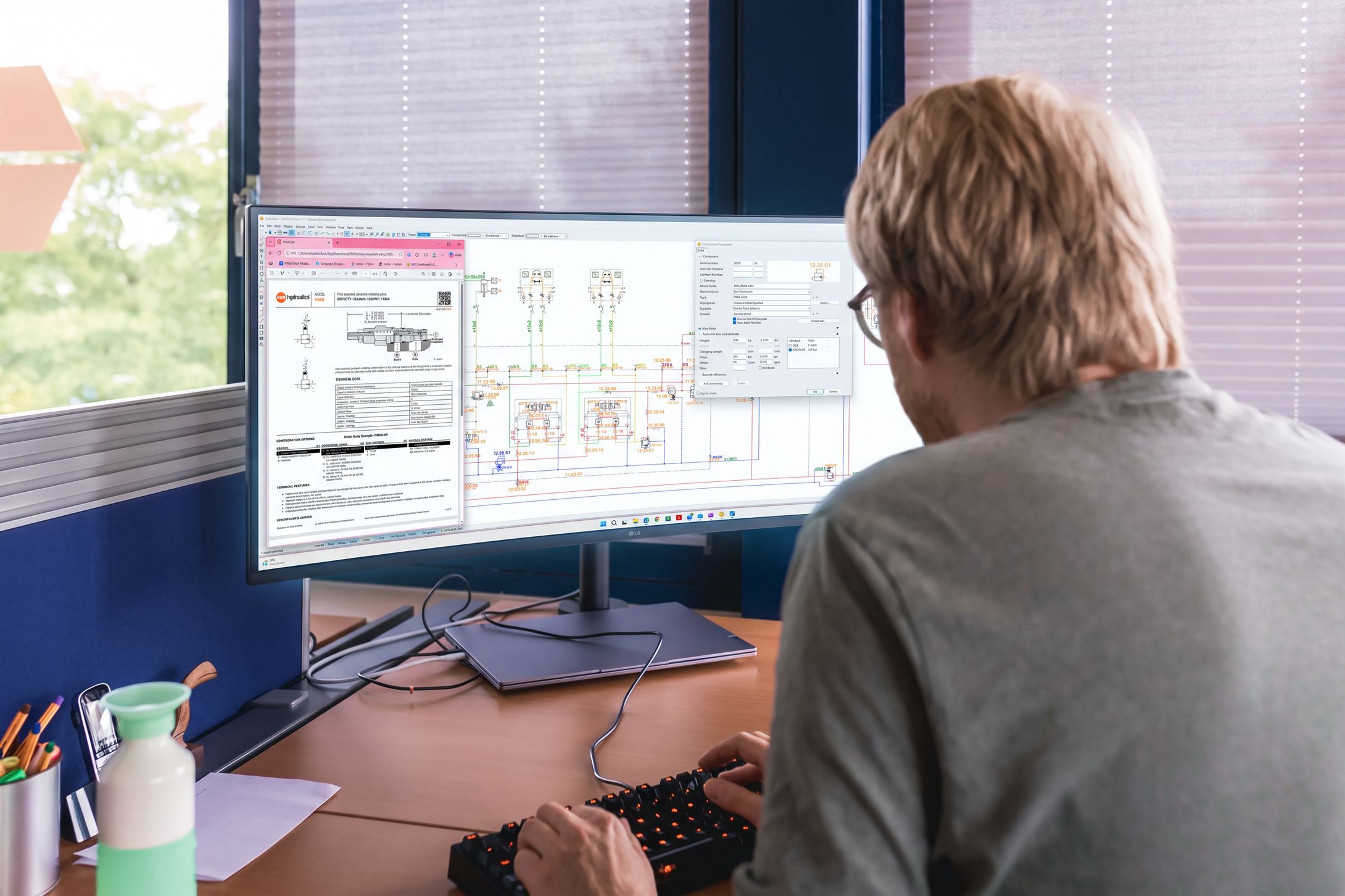 Engineer drawing a hydraulic schematic in HydroSym